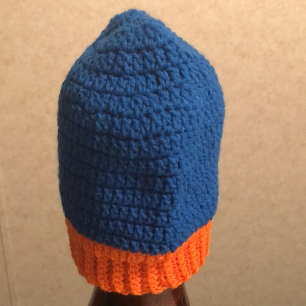 Handmade Crochet hat. Never worn. Blue and orange in color.